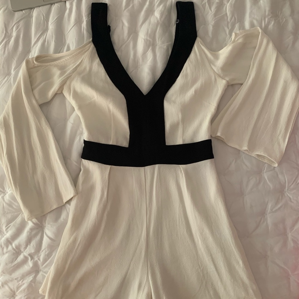 White and black cold shoulder, sleeved romper